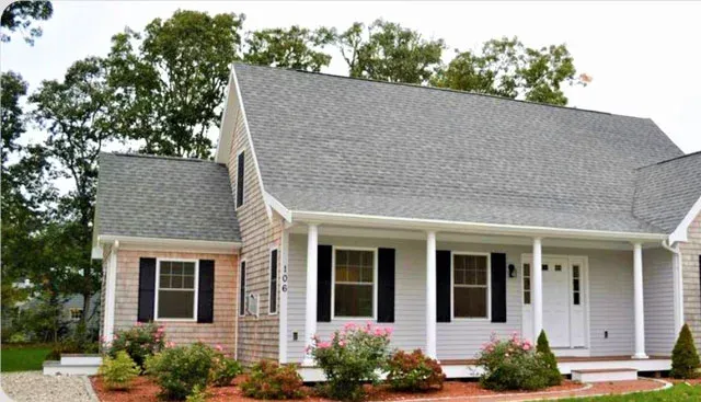 Cape-style modular home with front porch