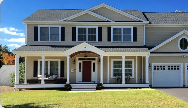 Colonial home with wraparound porch and garage in Westwood